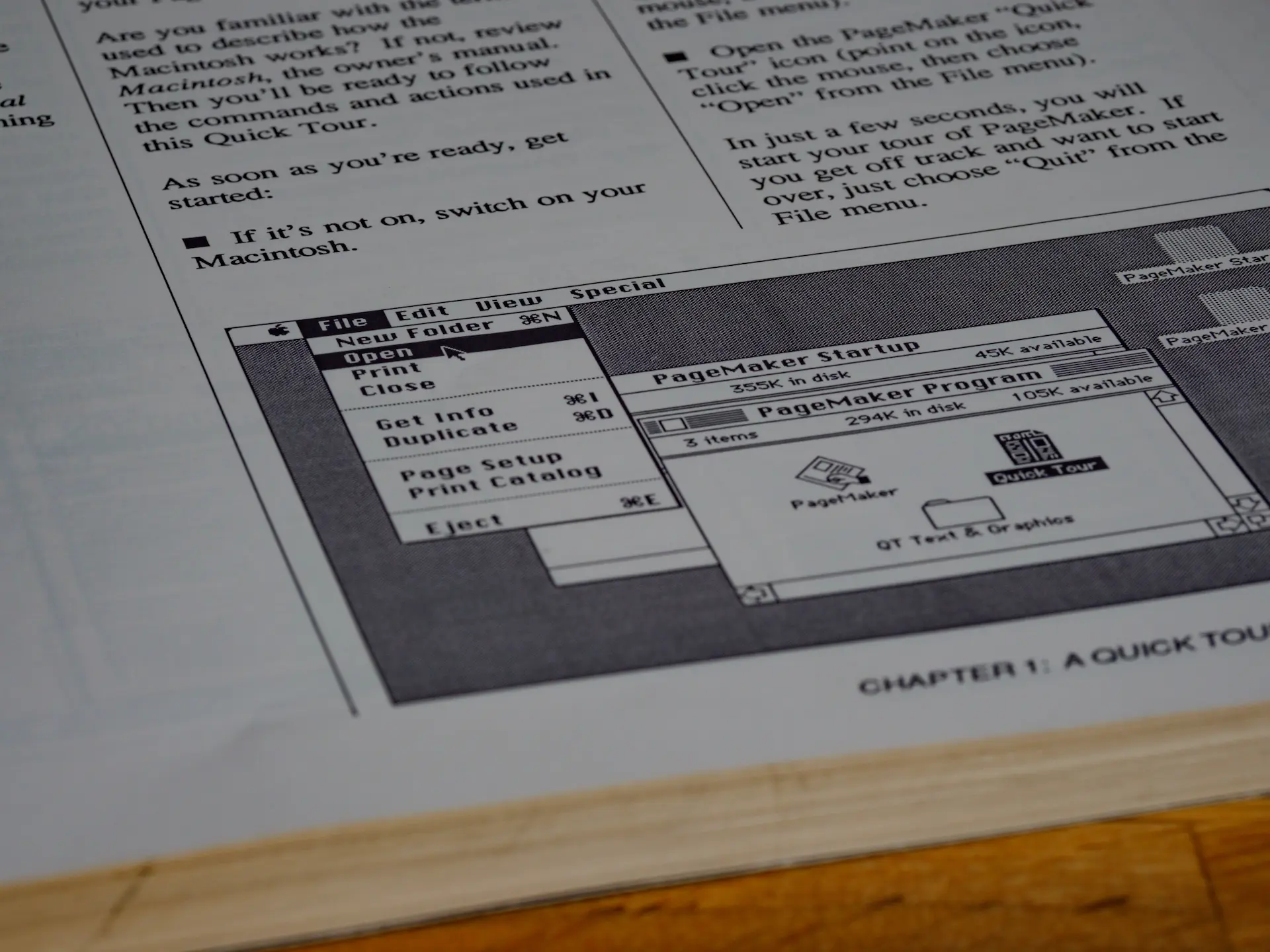 Photo of an old Macintosh PageMaker manual.