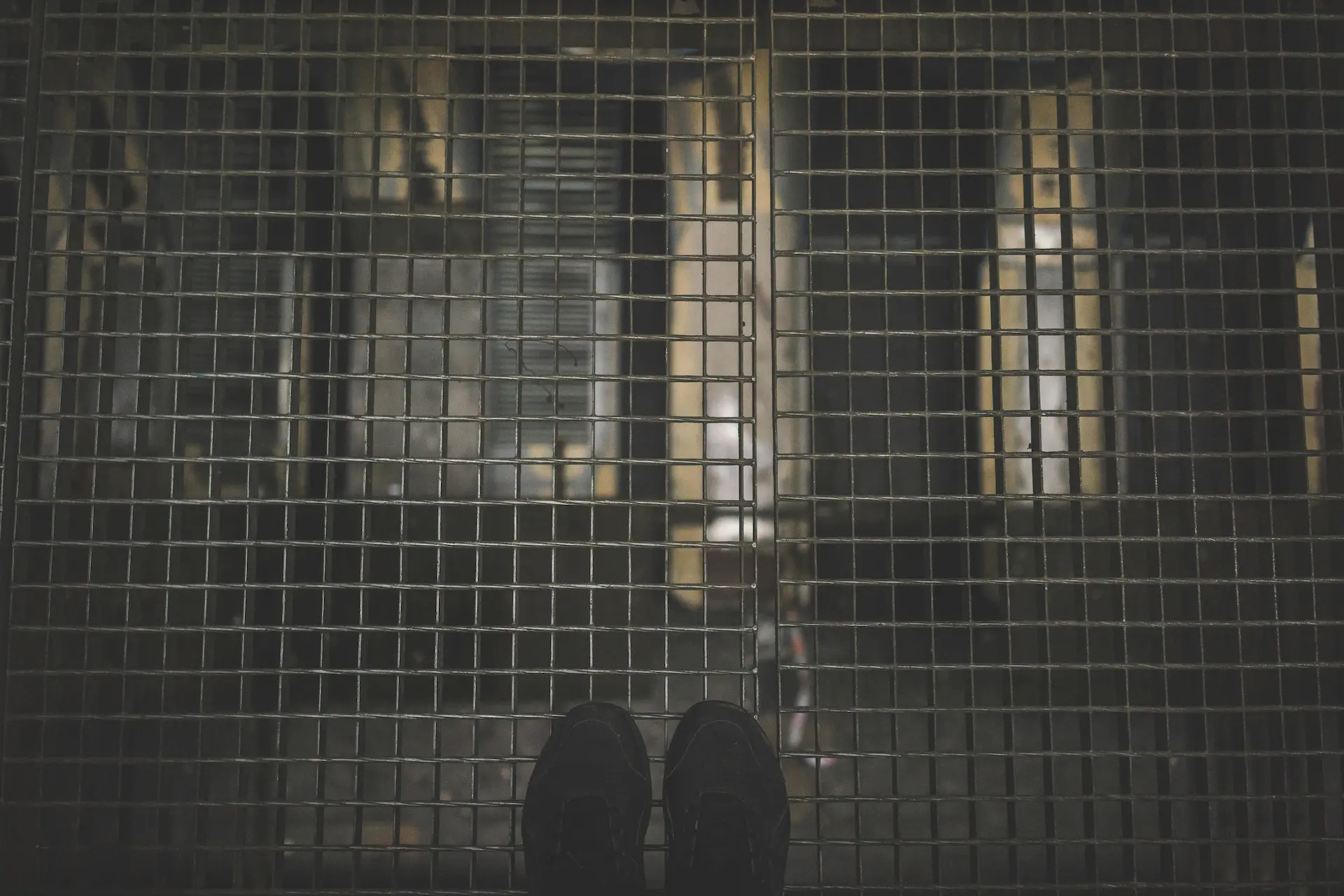 Looking down through a metal grate you find in factories.